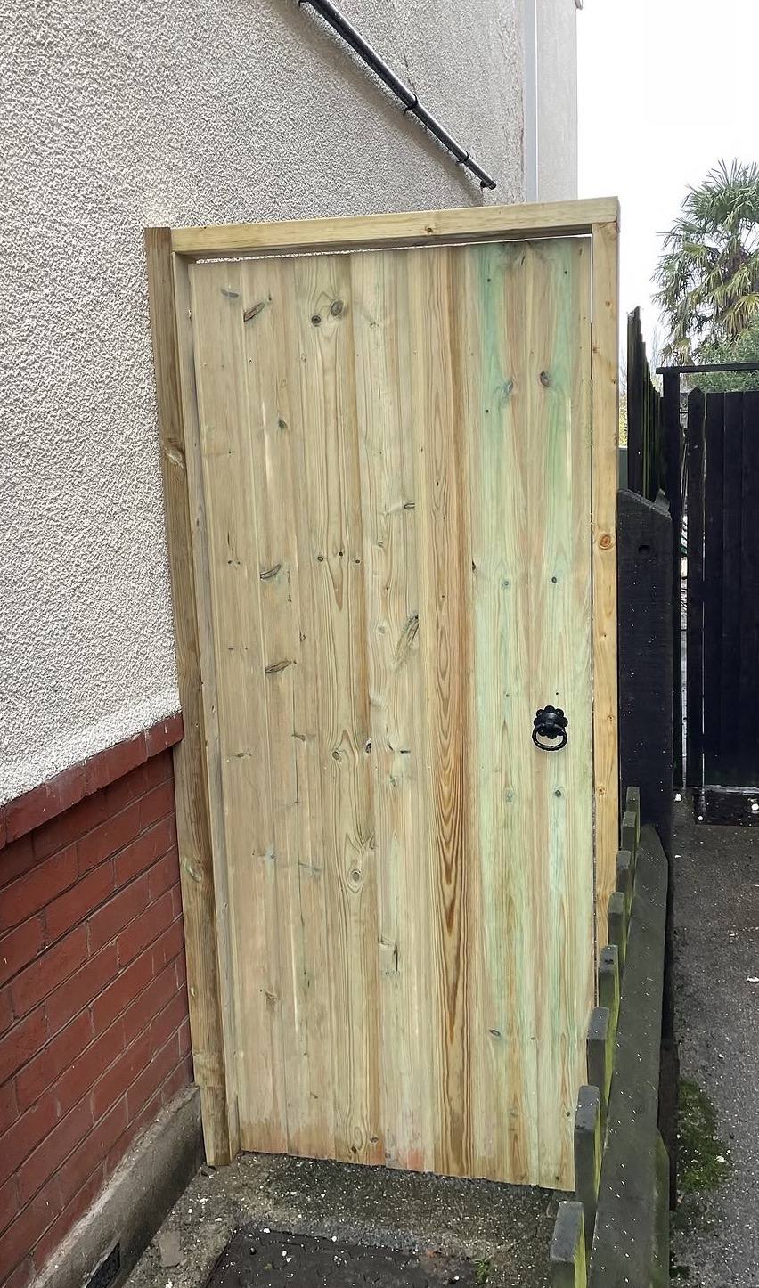 Boarded timber side gate in a hardwood frame with a ring latch