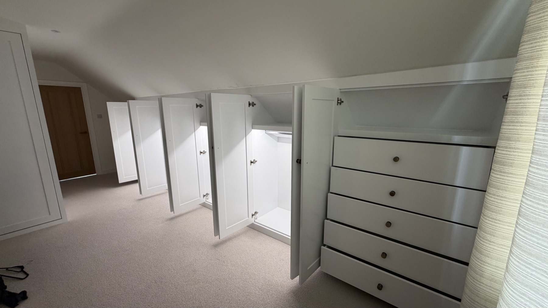 Fitted eaves wardrobes with LED lighting